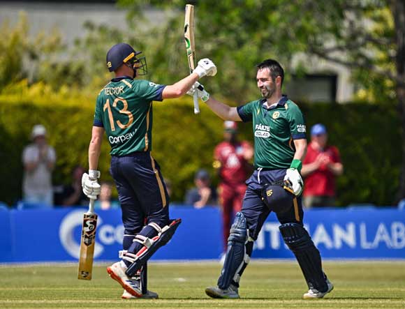 Andrew Balbirnie celebrates after reaching his century (Cricket Ireland/Sportsfile))