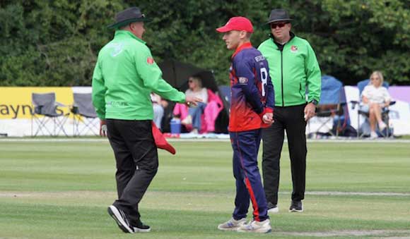 ... and the umpires take exception to what Dennison has said (CricketEurope)
