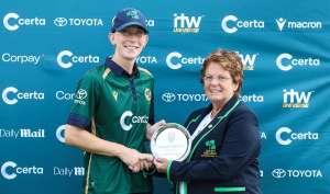 Orla Prendergast receives award from Cricket Ireland President Donna Armstrong
